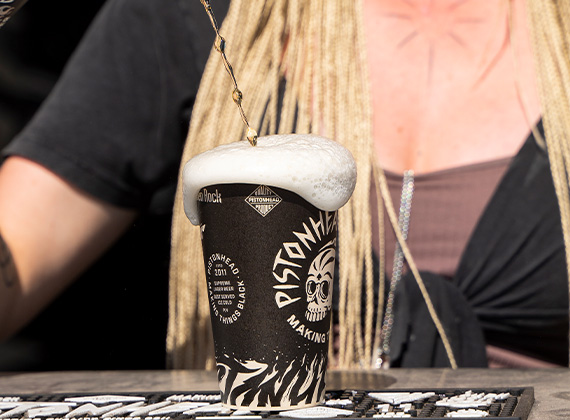 Pistonhead beer serviced in a customised biopak breeze cup at sweden rock festival