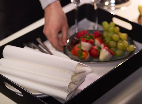 Premium linen feel napkin folded on room service tray